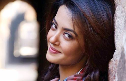 Surveen Chawla has acted in a Kannada movie Paramesha Panwala. She has also starred in Tamil, Telugu and Punjabi films.