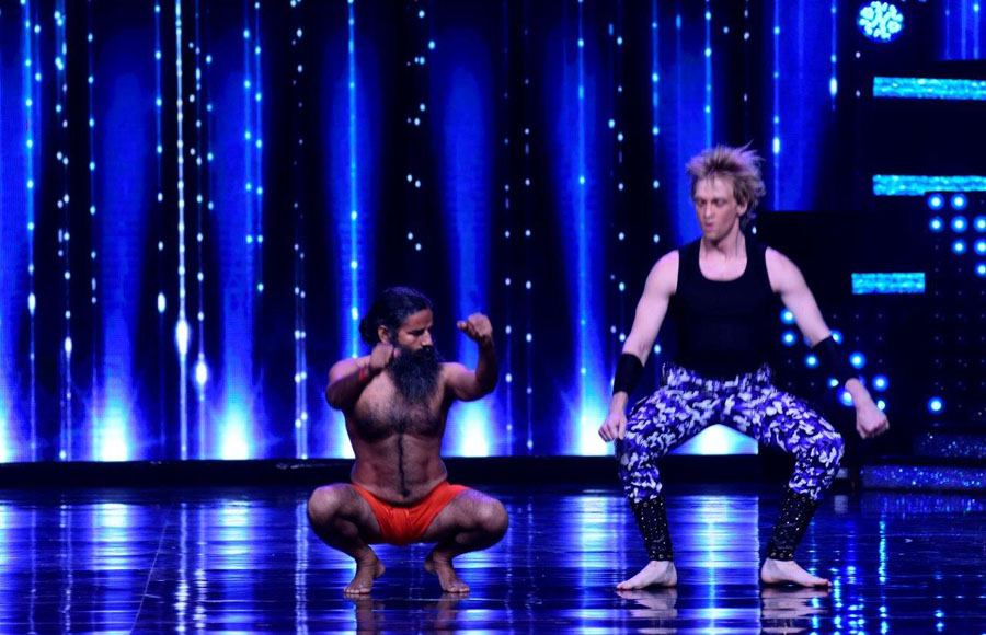 Baba Ramdeb performing Yoga with Brent on the sets of Nach Baliye 8