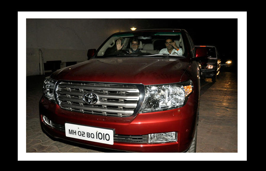 Amitabh with Abhishek on their Toyota