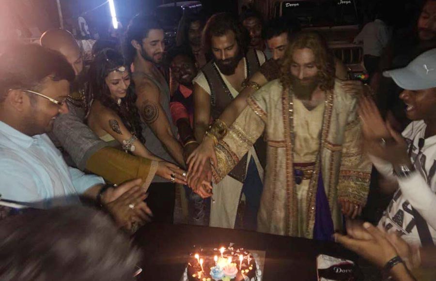 Porus team calls for a celebration on hitting a century!