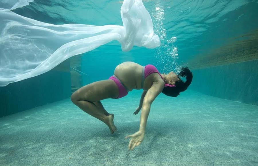 Sameera Reddy flaunts baby bump in underwater photoshoot