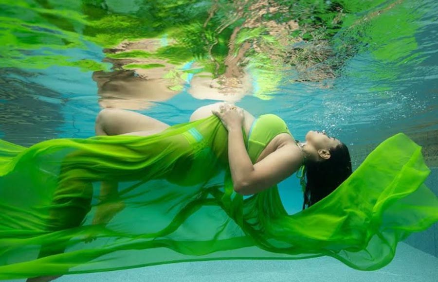 Sameera Reddy flaunts baby bump in underwater photoshoot