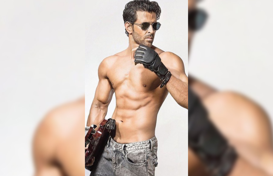 Check out the hot looks of Hrithik Roshana as he poses shirt - less pictures 