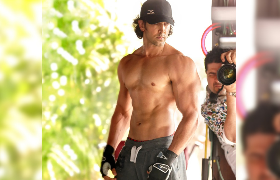 Check out the hot looks of Hrithik Roshana as he poses shirt - less pictures 