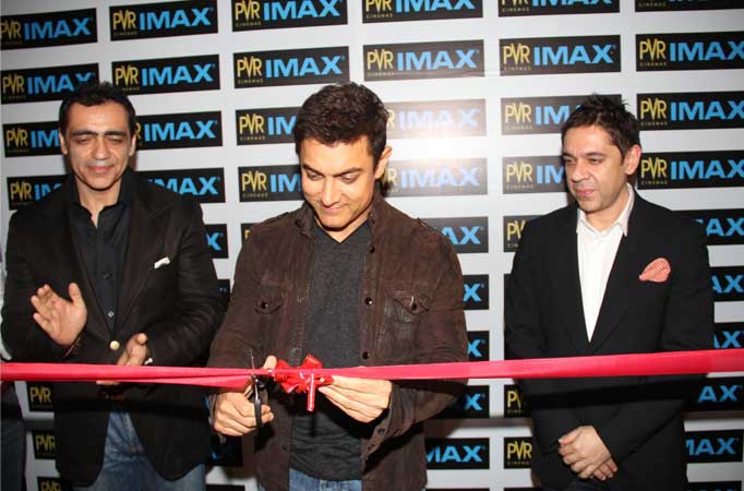 Actor Aamir khan inaugurates the PVR Imax theatre along with Mr. Ajay Bijli, CMD, PVR Ltd, and Mr. Sanjeev Bijli, JMD, PVR Ltd