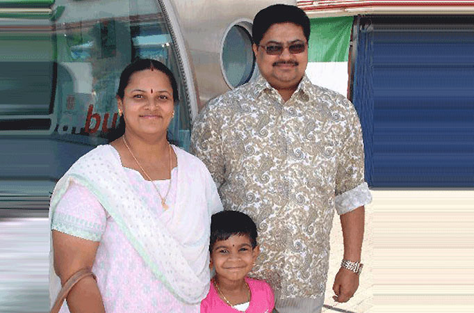 Malayalam film producer Santhosh Kumar, his wife Manju and their daughter Gouri 