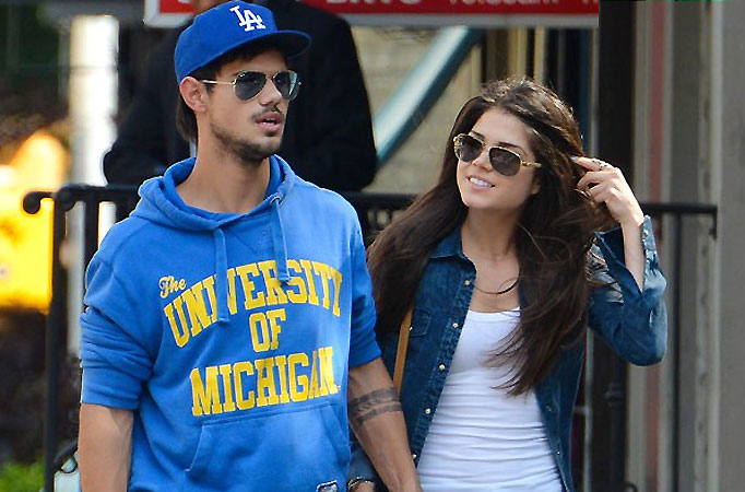 Taylor Lautner and longtime girlfriend Marie Avgeropoulos