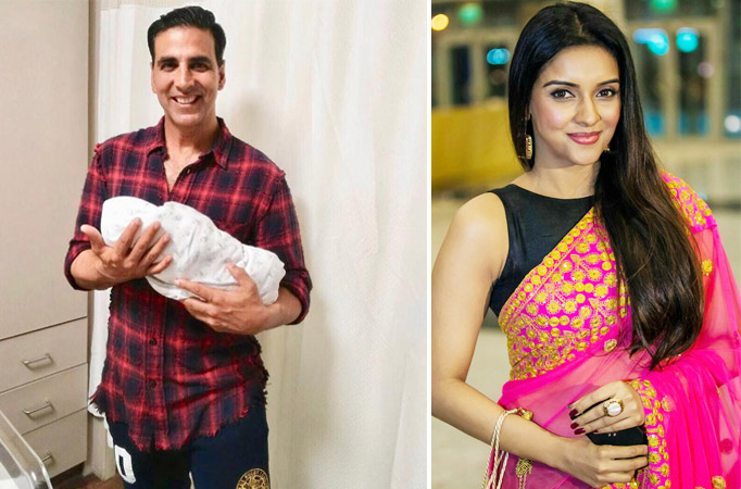 Akshay does cradle pose with Asin's newborn