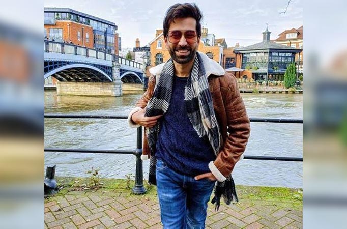 Nakuul Mehta is all smiles as he poses with Charlie Chaplin