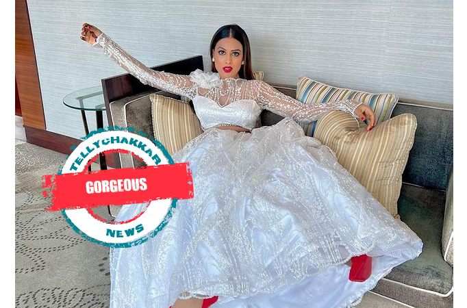 Gorgeous! Nia Sharma shines bright in a white lehenga on her brother’s wedding