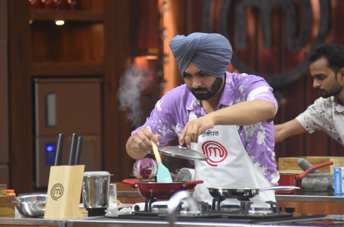 On Sony TV's "MasterChef India," Chef Ranveer Brar hails Top 16 contestant Gurkirat, calling his meal "perfectly balanced," whil