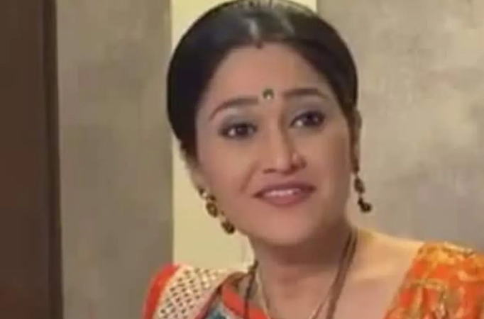  Disha Vakani crying while holding a child?