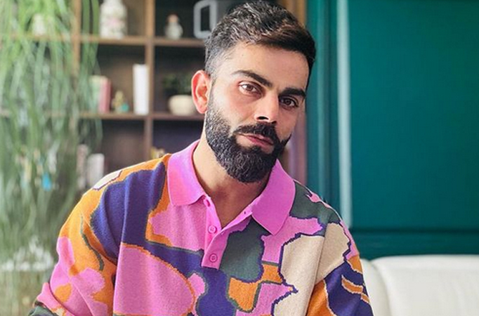 Virat Kohli gently asks fans to avoid taking videos; says “Bhai Ashram Hai Ye”