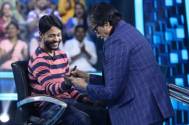 Big B autographs 'KBC 14' contestant's hand to not confuse him with his twin